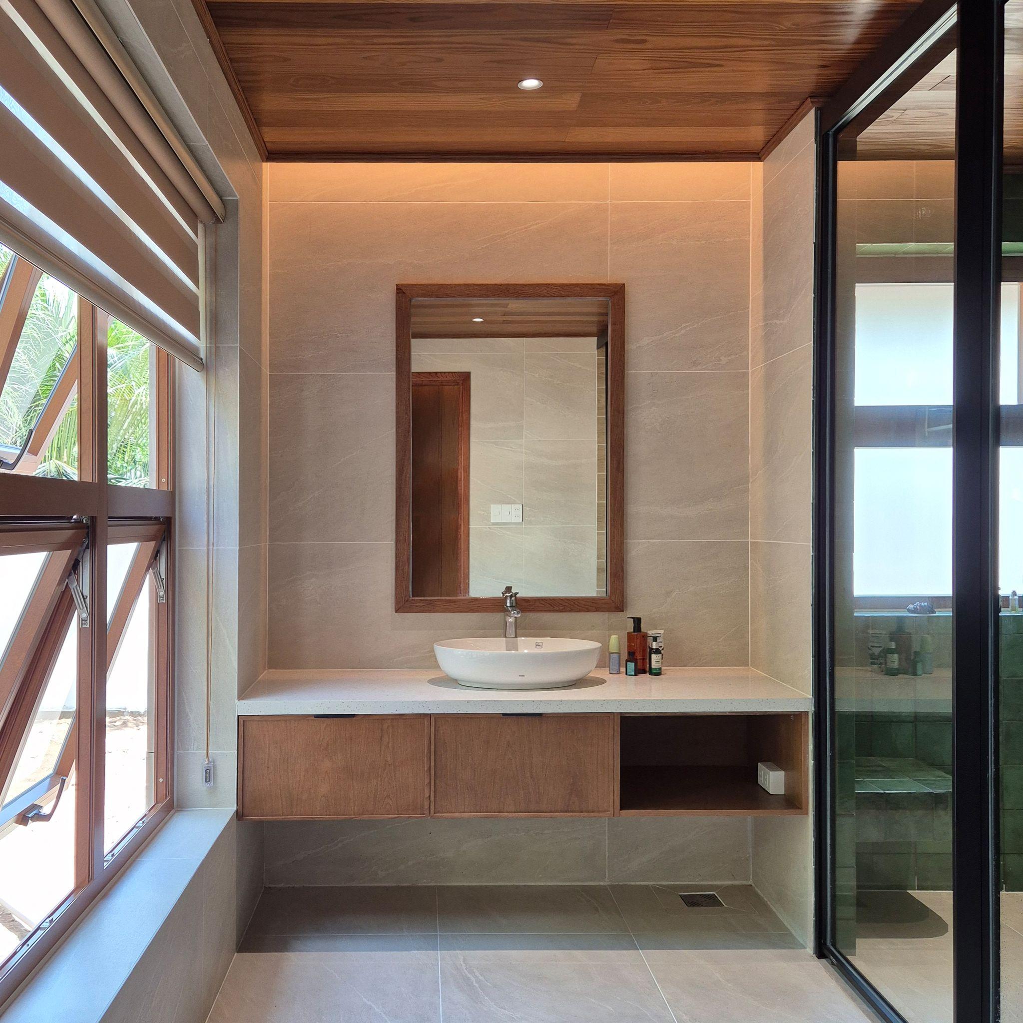 my-tho-villa-to-chuc-khong-gian-xoay-quanh-trai-tim-bep-viet-lee-architects_26.jpg
