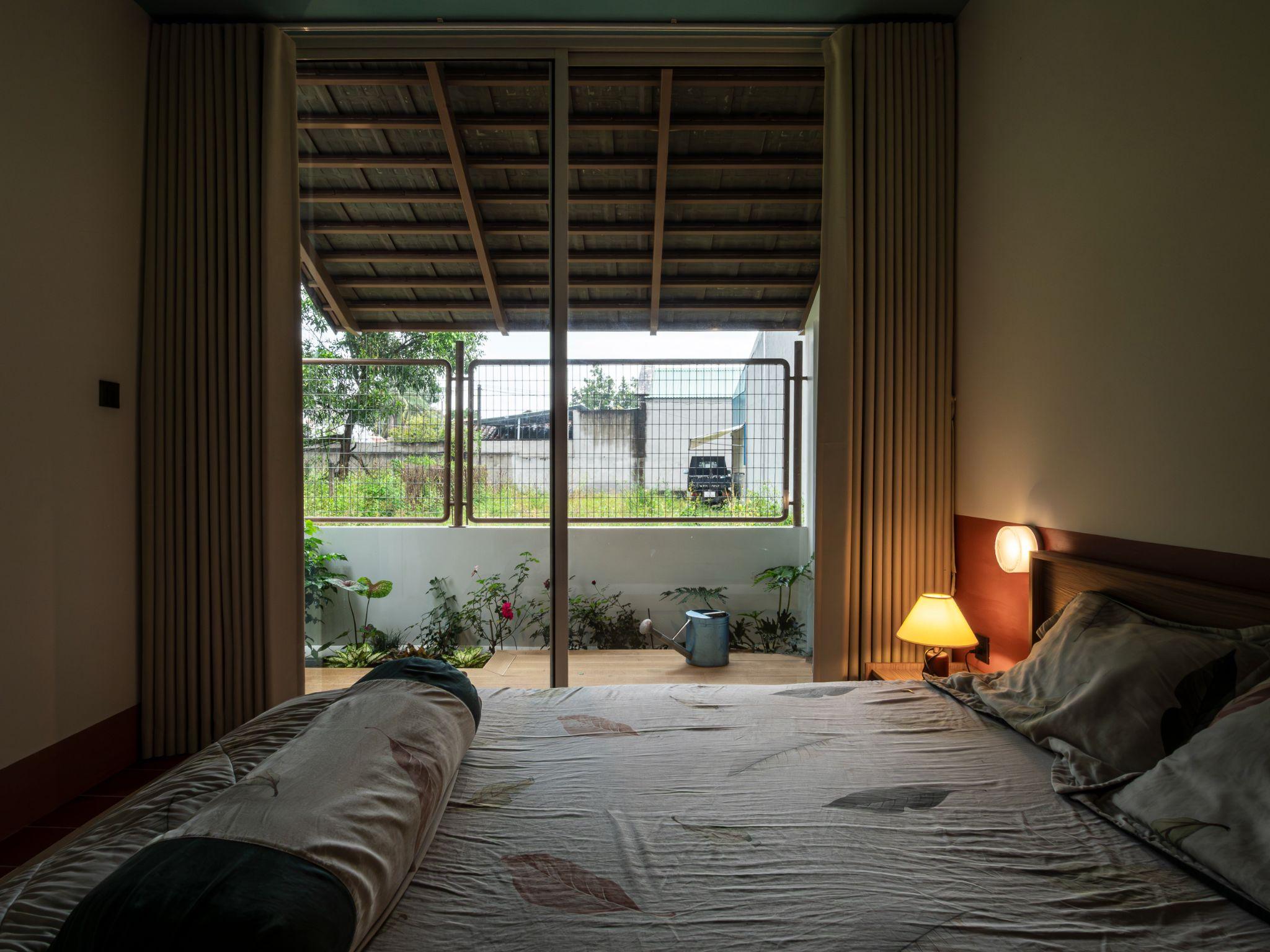 nha-tan-an-cai-tao-nha-vuon-dong-nam-bo-theo-huong-thich-ung-hien-dai-butecco-design-build_18.jpg