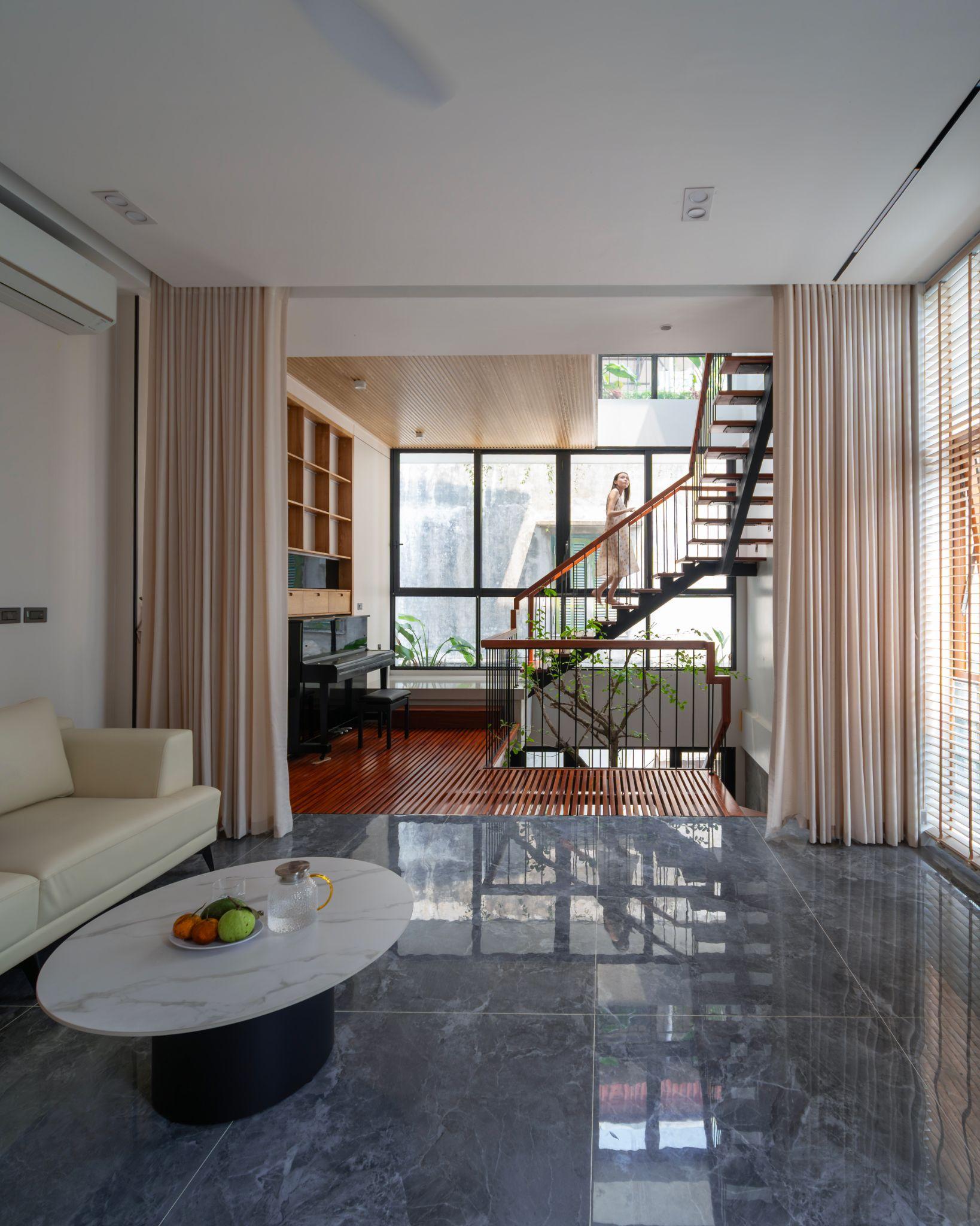 nha-thanh-ha-nha-pho-voi-loi-canh-quan-xanh-tmta-architecture_3.jpg