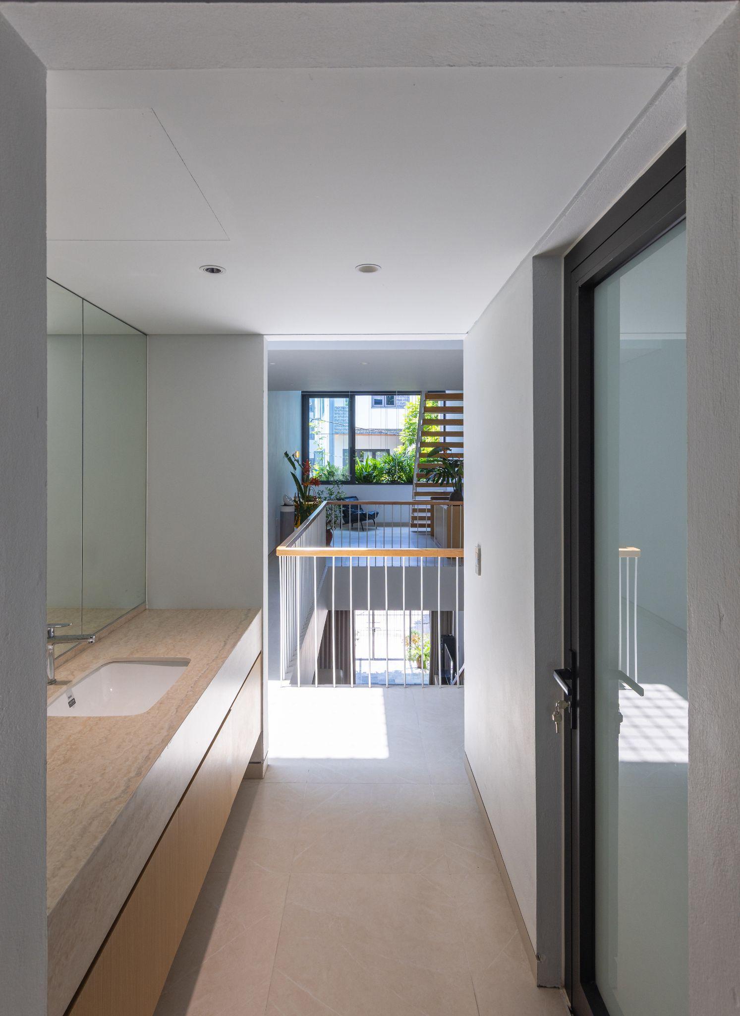 tb-house-dung-khoang-rong-nuoi-duong-su-gan-ket-ntaa-architects_17.jpg