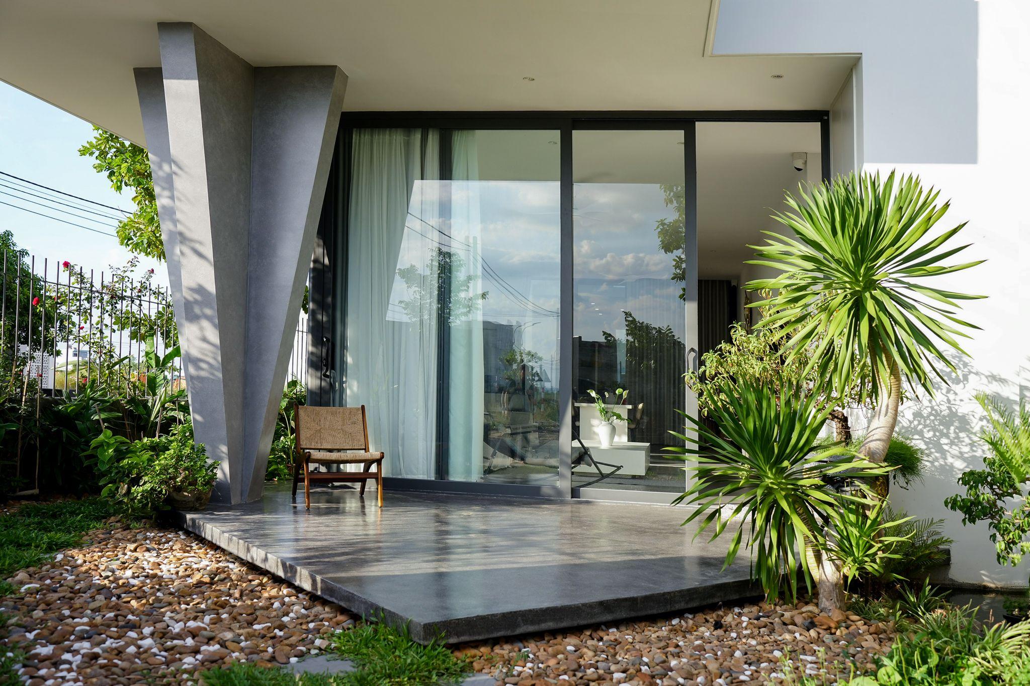 lt-house-hinh-khoi-hien-dai-gan-lien-voi-khoang-xanh-thien-nhien-ben-vung-nna-design_4.jpg