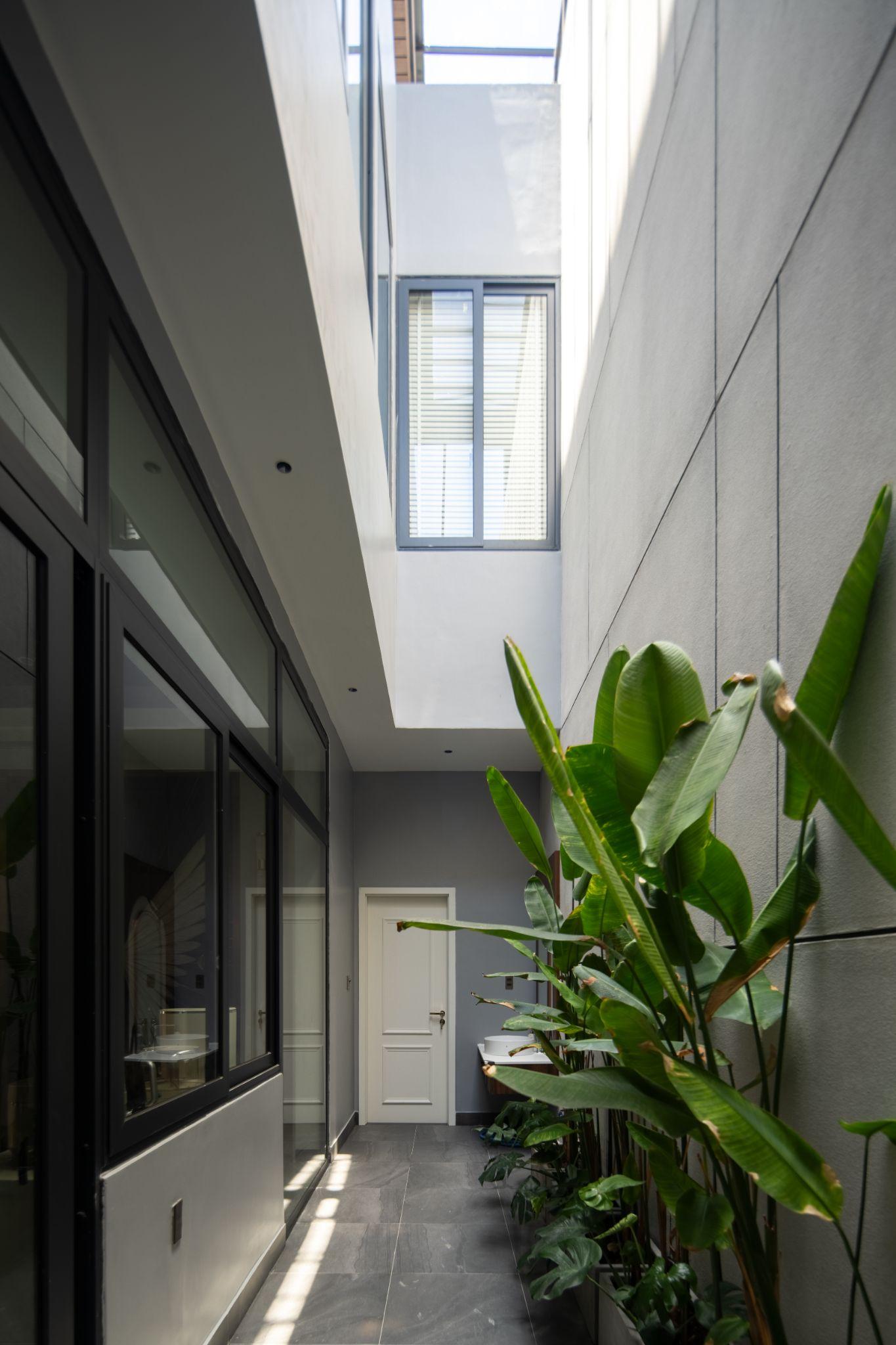 qh-villa-biet-thu-pho-voi-he-khoang-dem-xanh-tai-da-nang-ipm-architects_7.jpg